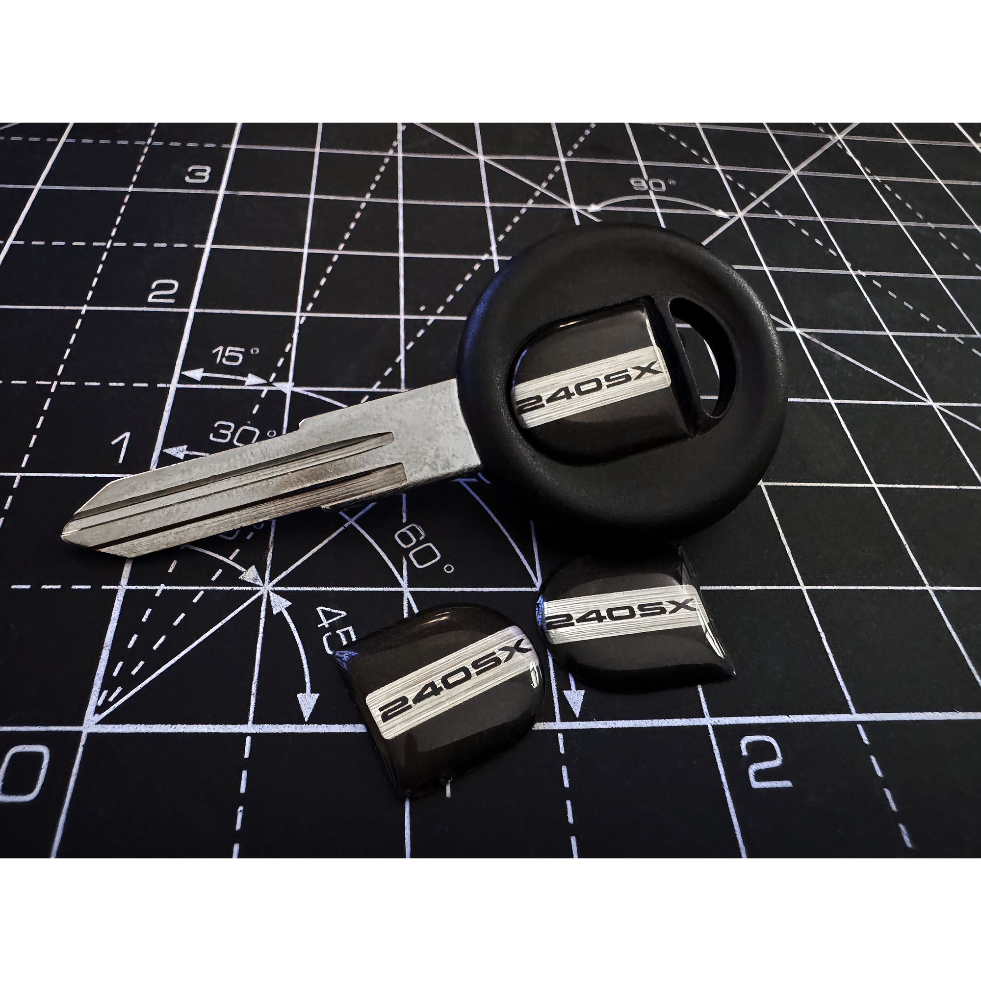 thumbnail interactive-video image 1 of Nissan 240SX 180SX RPS13 Genuine JDM Front Emblem Badge – OEM Silver 1 of 3